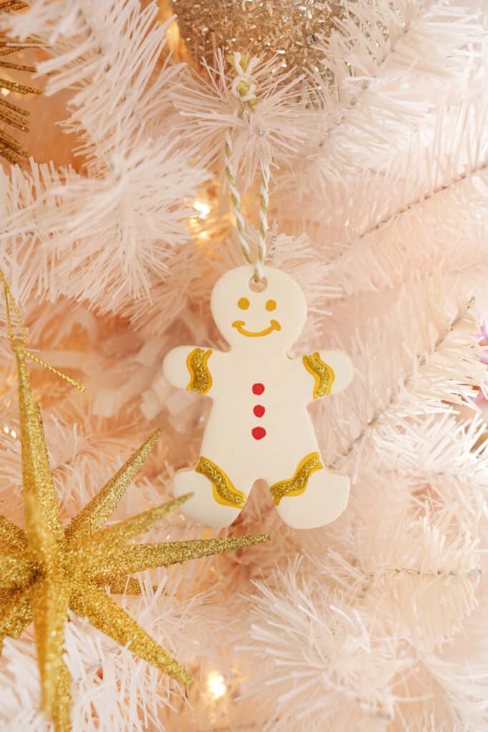 gingerbread person ornament on tree